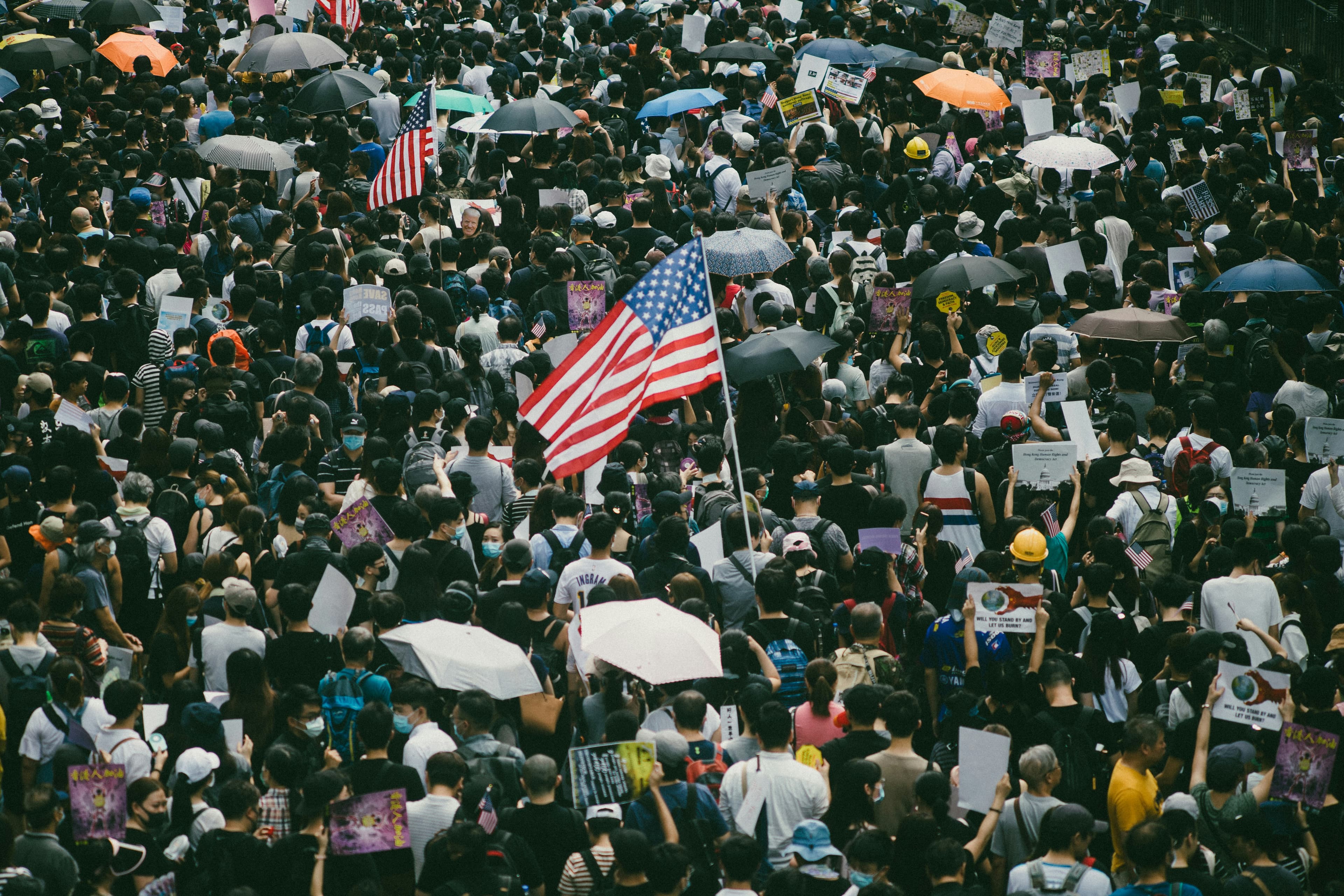 People standing together at a community demonstration